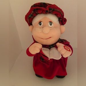 T.L. Toys Musical Grandma Christmas Caroler sings “We Wish You a Merry Christmas
